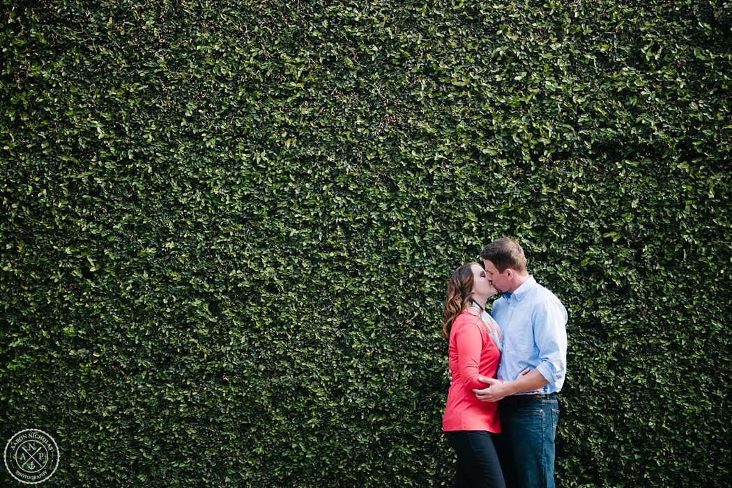 downtown Charleston Engagement photos, expats meet in Sudan, expats meet in Africa! Southern engagement photos, how they met, how we met, Charleston wedding photographer, Aaron Nicholas Photography, destination wedding photographer, Cypress Garden's wedding, Jennifer Bussey and Bobby Bender, Samaritan's Purse couple, engagement posing on an ivy wall