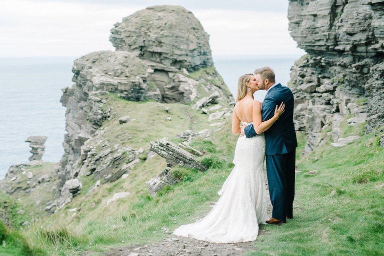 Bride and groom on the cliffs of moher, Cliffs of Moher wedding by Aaron and Jillian Photography