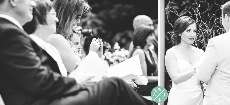 Wedding vows at a New York Botanical Gardens wedding by Charleston wedding photographers Aaron and Jillian Photography -_0045