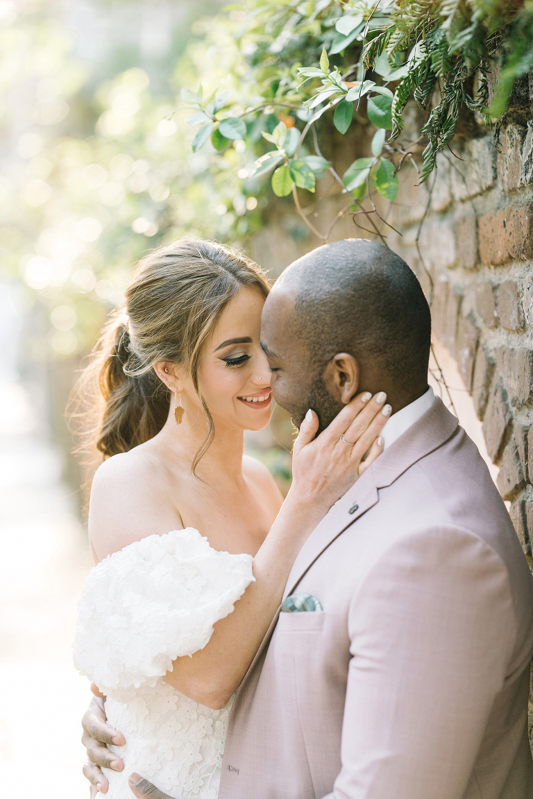 downtown Charleston engagement session, couple from London, what to wear to your engagement session, hair and makeup for engagement sessions, party pony